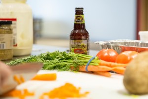 All Day IPA bottle with carrots, tomatoes, potatoes and other indredients