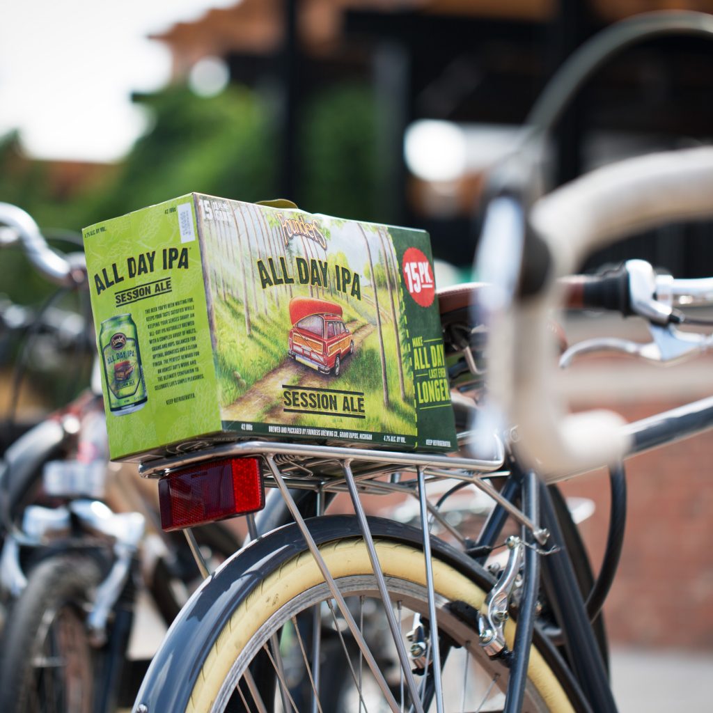15 pack of Founders All Day IPA sitting on bike