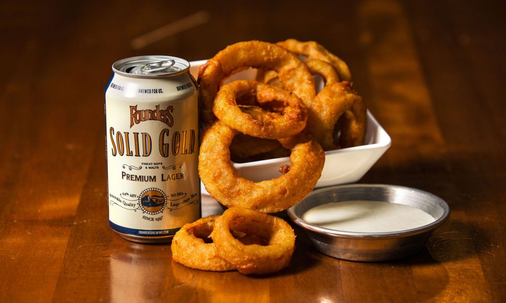 Can of Founders Solid Gold with onion rings