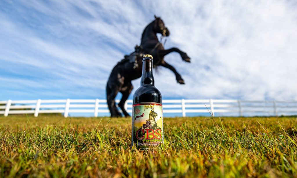 Bottle of Founders CBS with horse