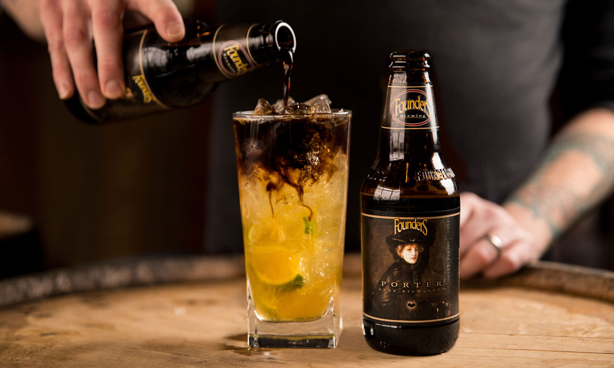 Man making cocktail with Founders Porter