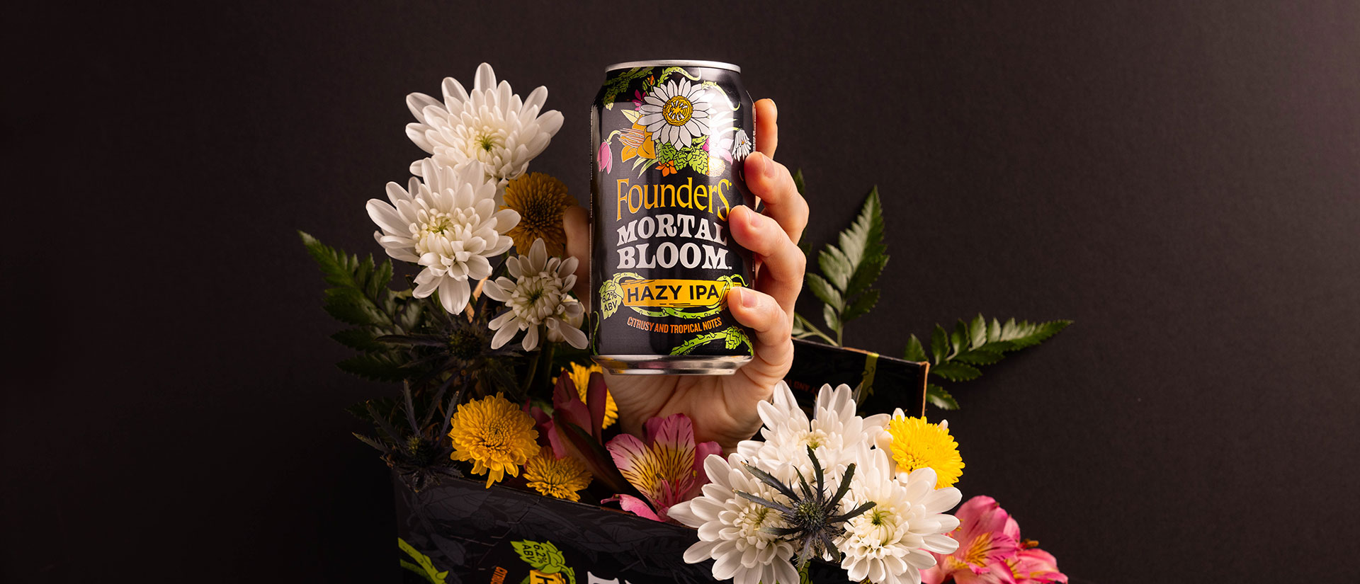 Mortal Bloom 12oz can with flowers