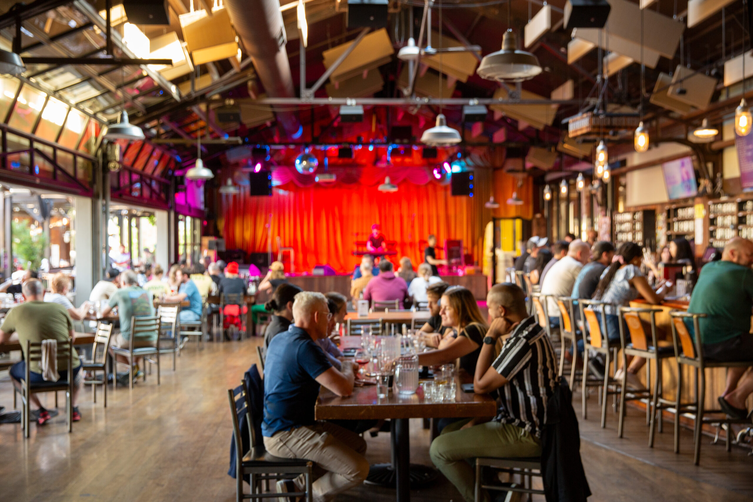 wide view of Founders taproom and stage