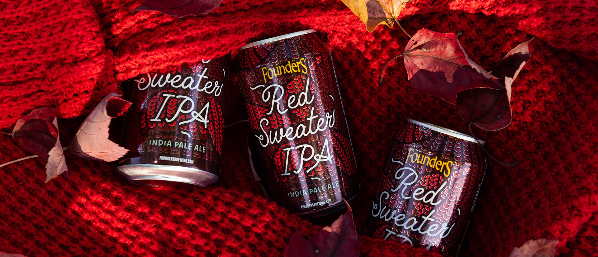 Red Sweater IPA in a red sweater