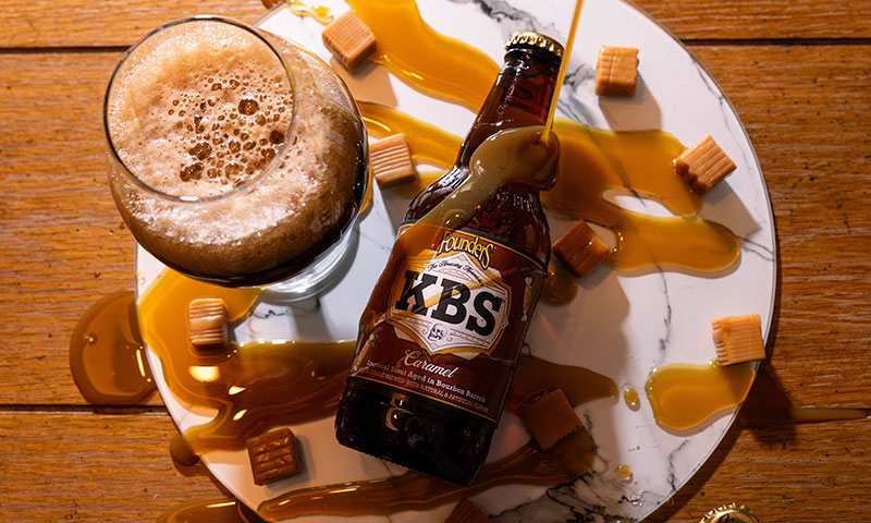 KBS Caramel dripped in caramel with a draft pout next to it